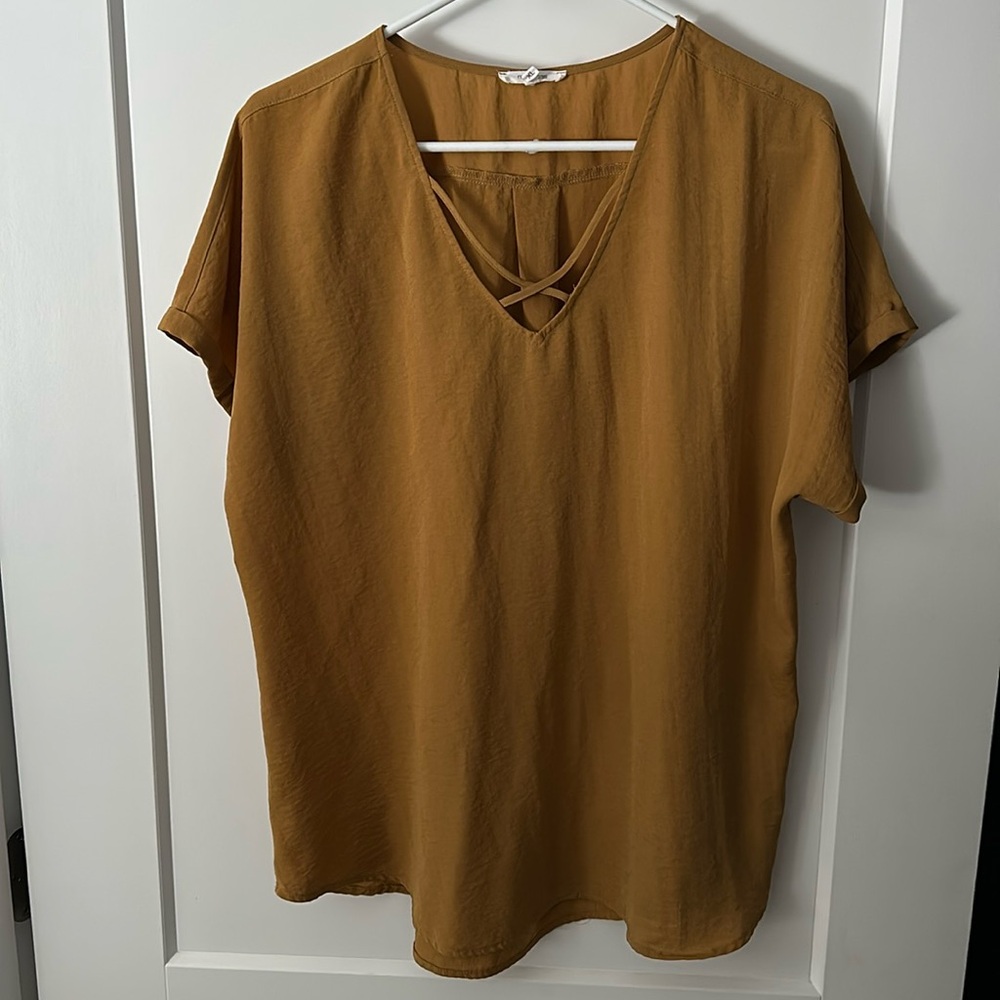 Short sleeve mustard colored Maurice’s top size XL